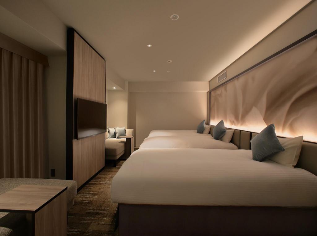 Oriental Hotel Universal City Room Type - Deluxe Triple Room with Lounge Access Oriental Hotel Universal City Room Type - Deluxe Triple Room with Lounge Access