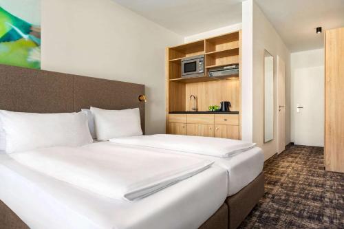 Wyndham Garden Munich Messe Room Type - Superior Room, 2 Twin Beds, Kitchenette, Balcony, Non-Smoking Wyndham Garden Munich Messe Room Type - Superior Room, 2 Twin Beds, Kitchenette, Balcony, Non-Smoking