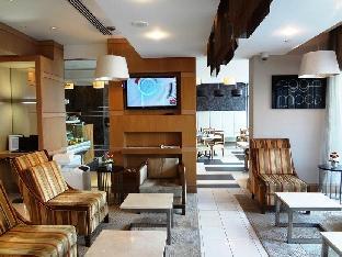 Oaks Liwa Executive Suites - Tap to explore photos