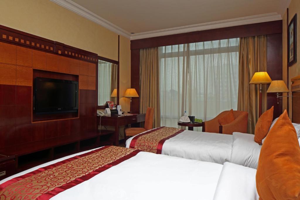 Ramada by Wyndham Riyadh, Riyadh - Tap to explore photos