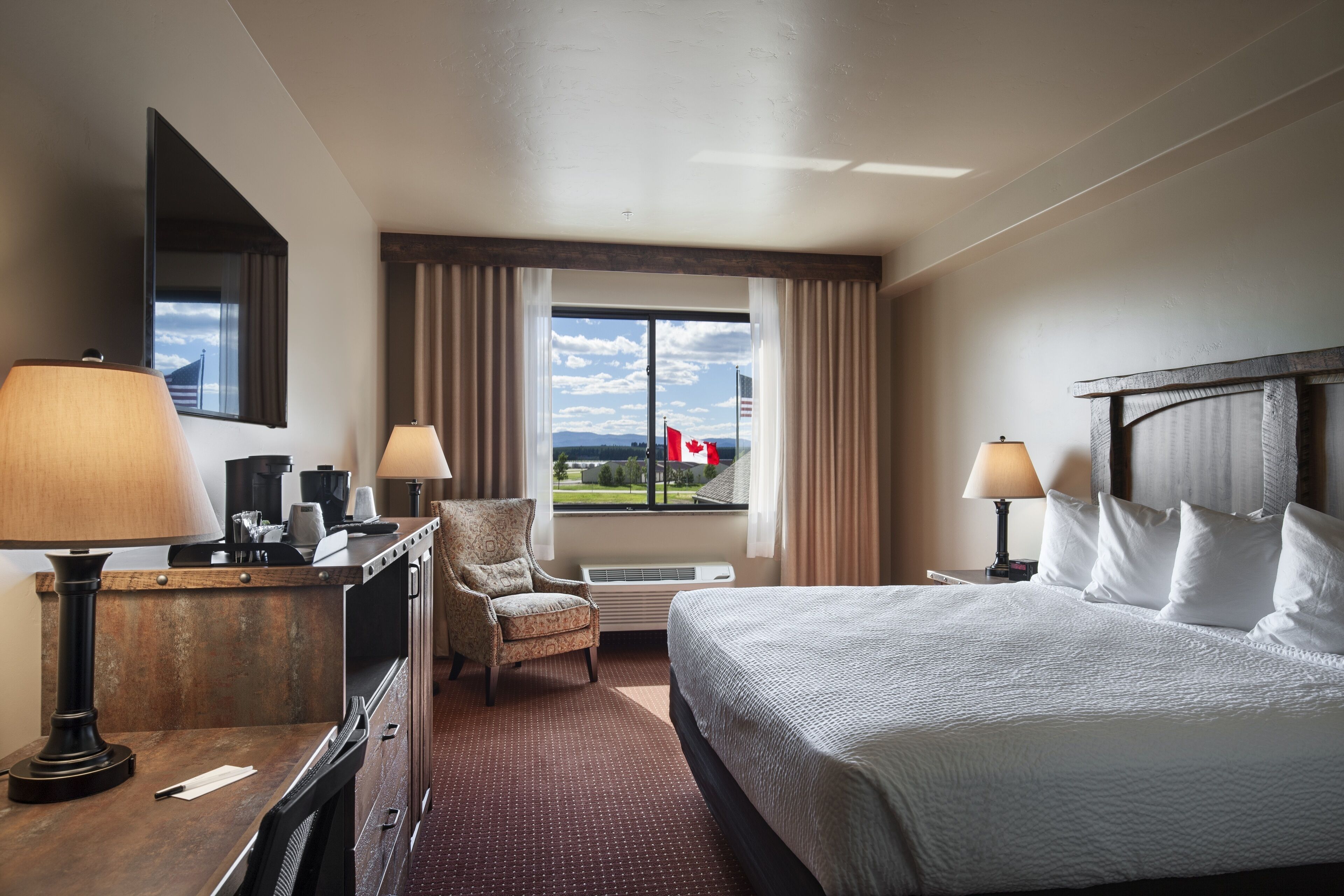 Glacier International Lodge - Tap to explore photos