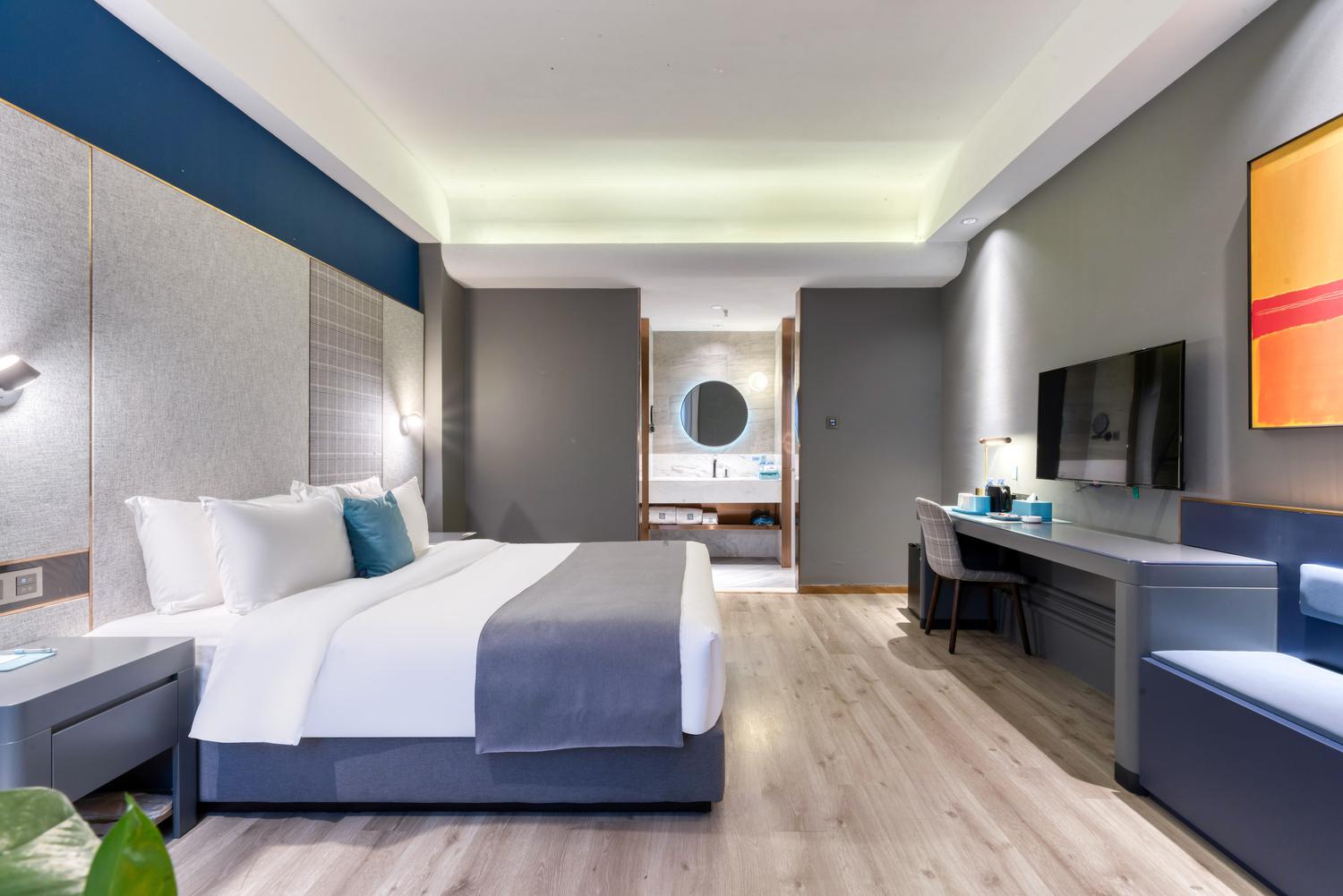 LANOU Hotel (Heze Mudan Park Baicheng University Town) - Tap to explore photos