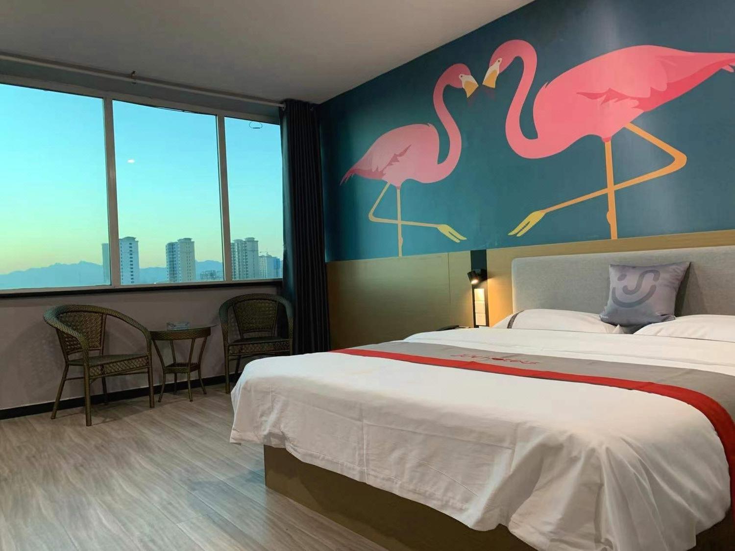Junyi Chain Hotel (Shunping Baoding Bank) - Tap to explore photos