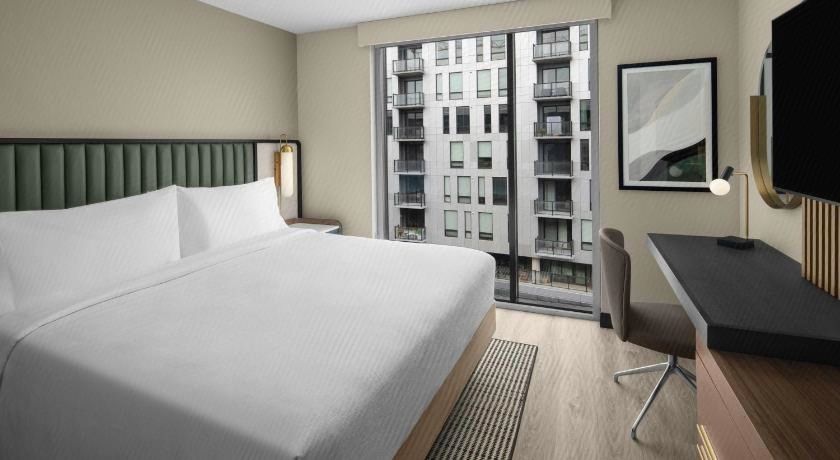 Embassy Suites by Hilton Madison Downtown - Tap to explore photos