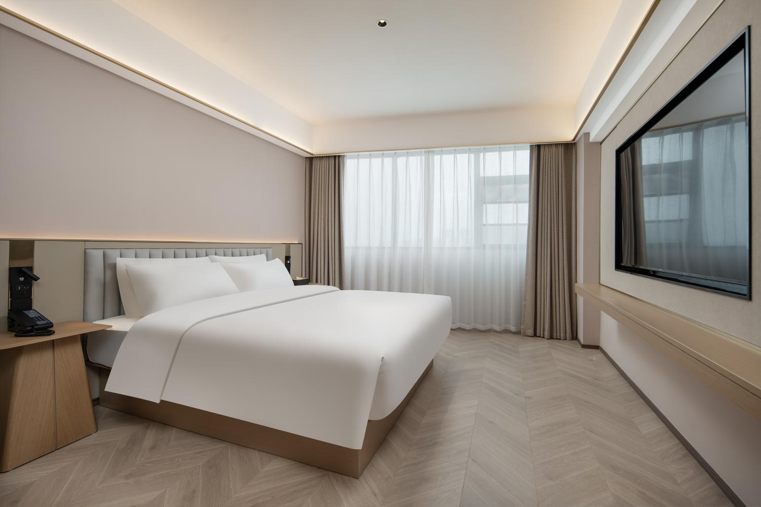 Starway Hotel (Wan'an Fenghuang Plaza) - Tap to explore photos