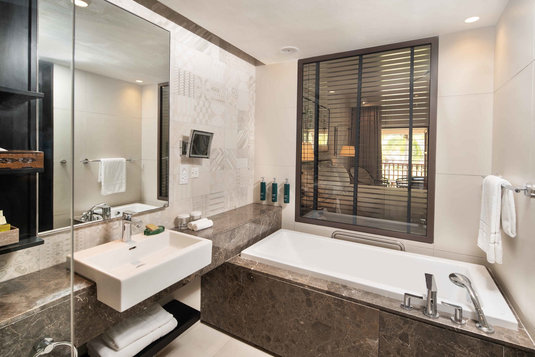 Hilton Mauritius Resort & Spa Room Type - Grand Deluxe King Room with Partial Ocean View Hilton Mauritius Resort & Spa Room Type - Grand Deluxe King Room with Partial Ocean View