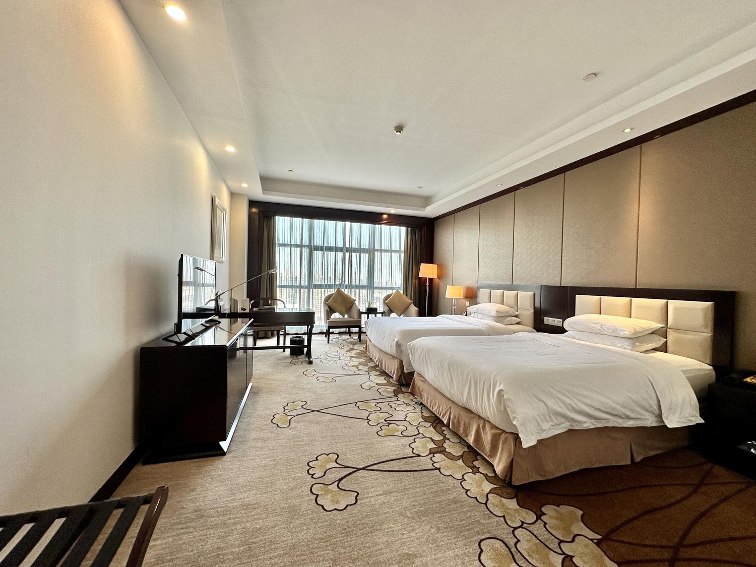 Jinling New Town Hotel Nanjing - Tap to explore photos