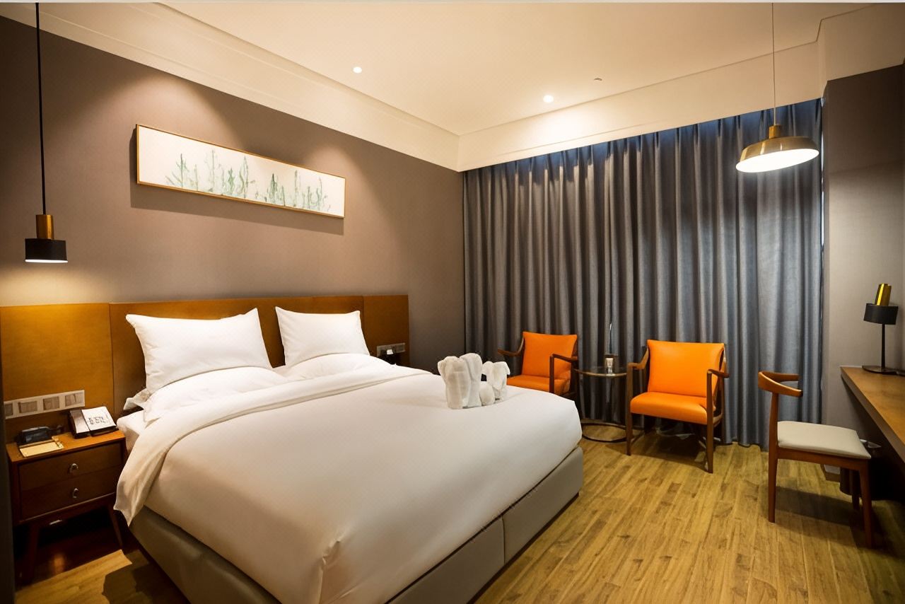 Longchang Theme Hotel (Jinsha Times Square) - Tap to explore photos